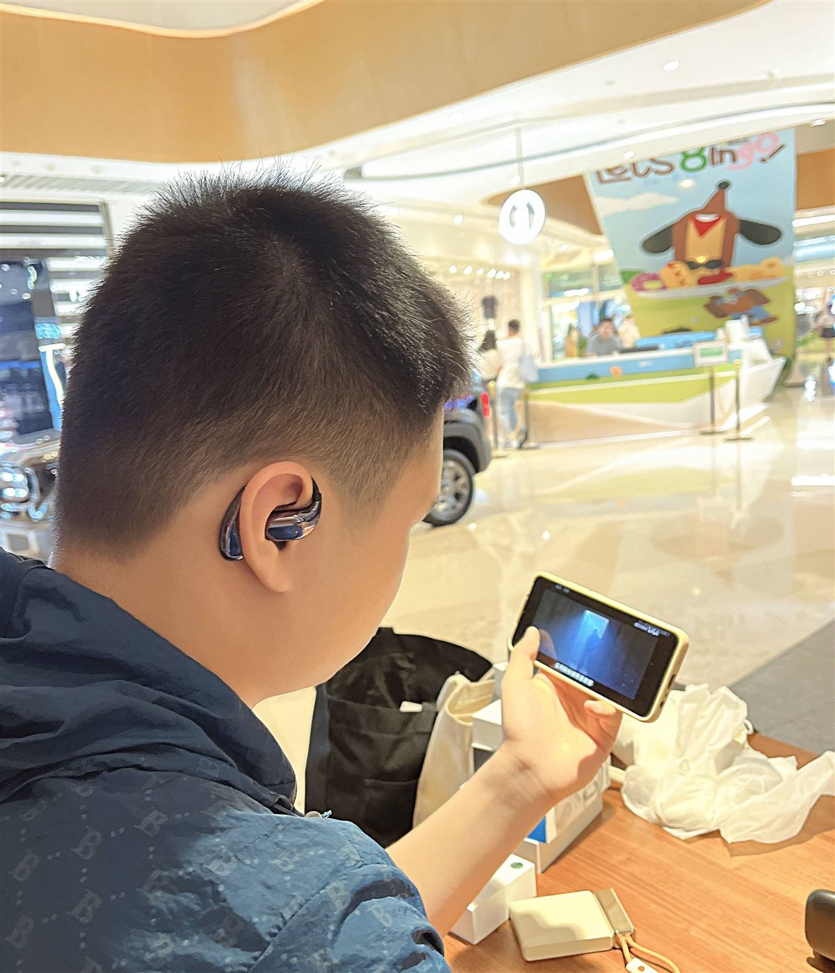 Translation earbud worn in the ear