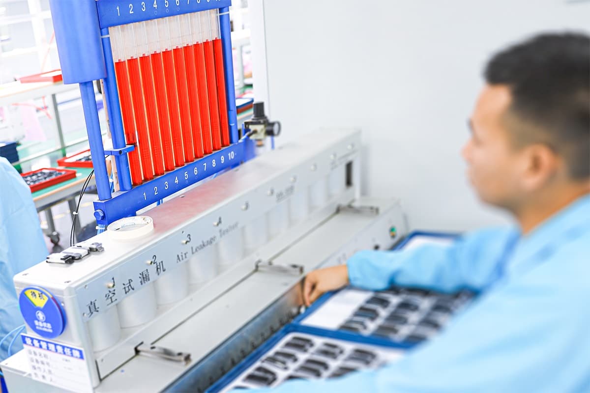 Quality control lab with test rigs for wearable devices
