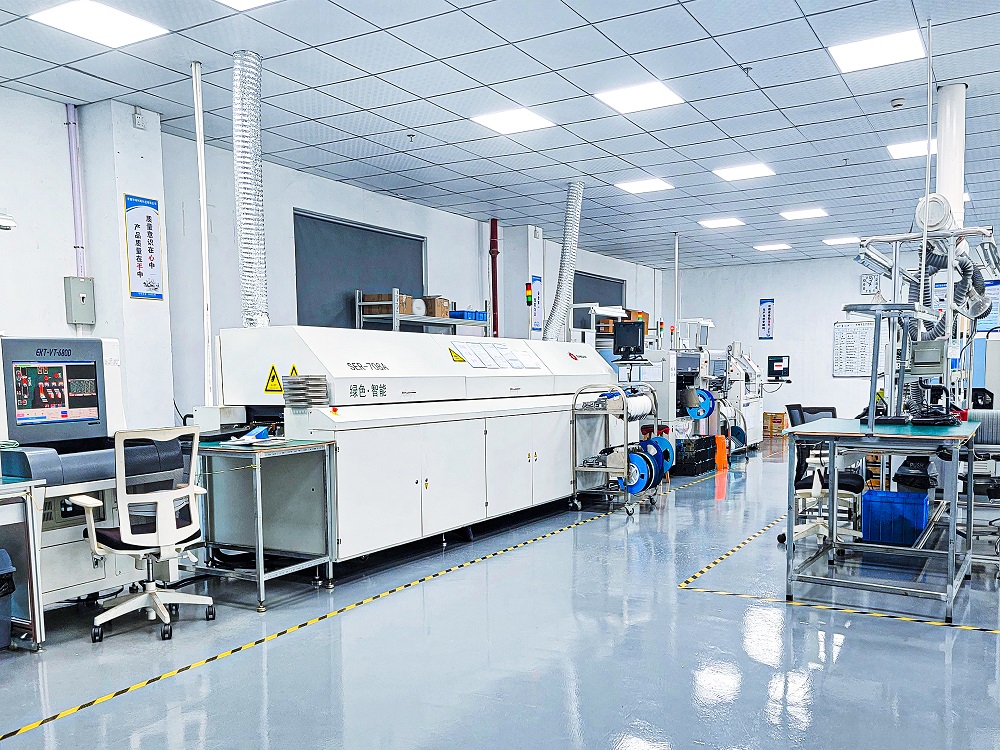 SMT pick and place line populating wearable main boards