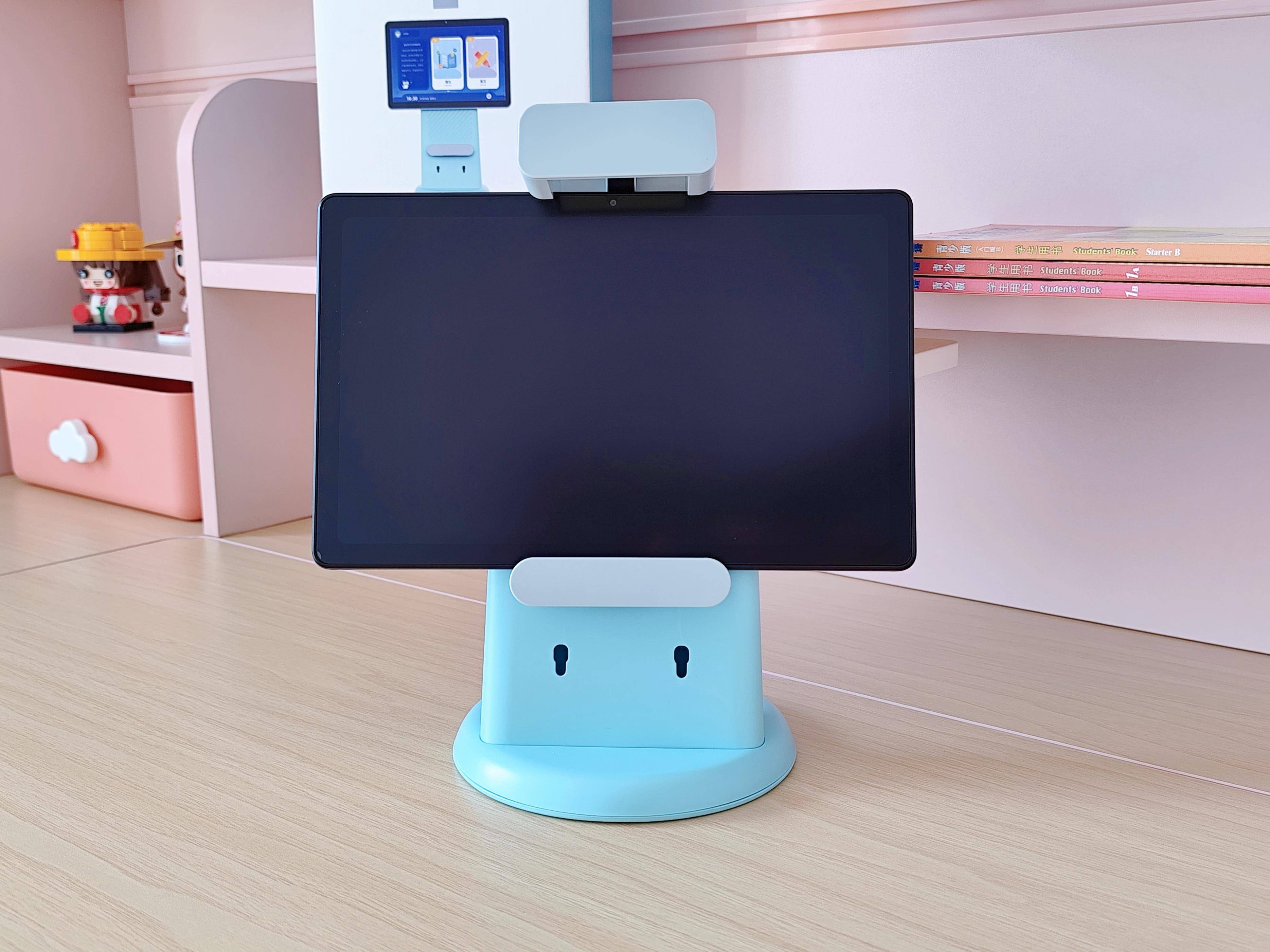 Children's learning tablet on its kickstand with a stylus