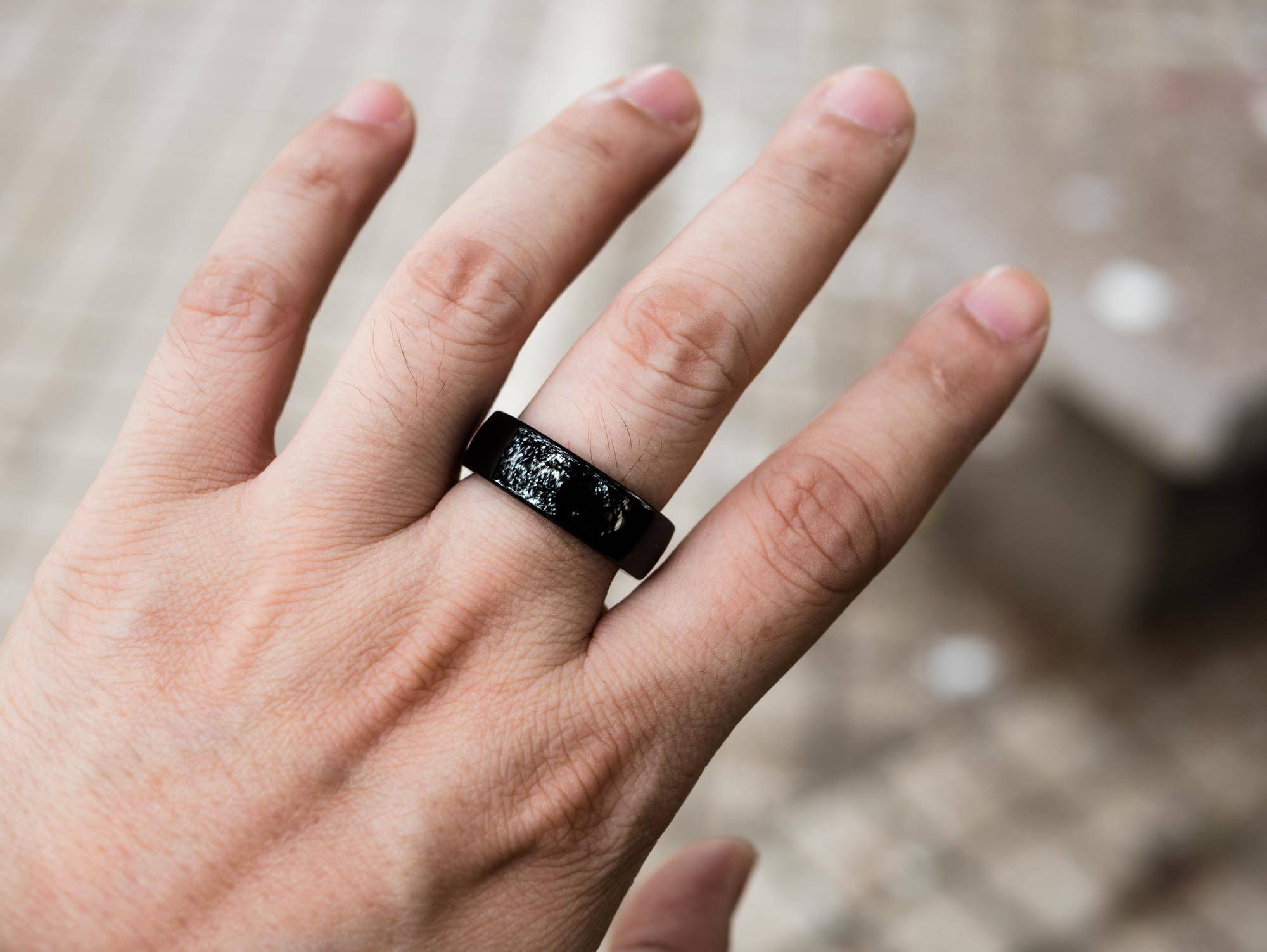 The R1 health ring worn on a finger